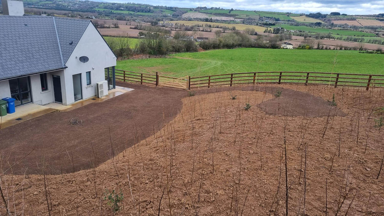 Aerial view of a newly laid garden with fencing